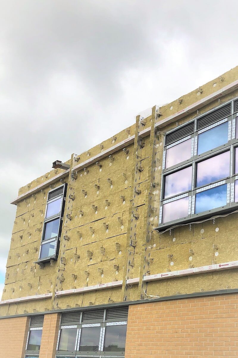 Horizontal & Vertical fire barrier installation before rainscreen façade installed