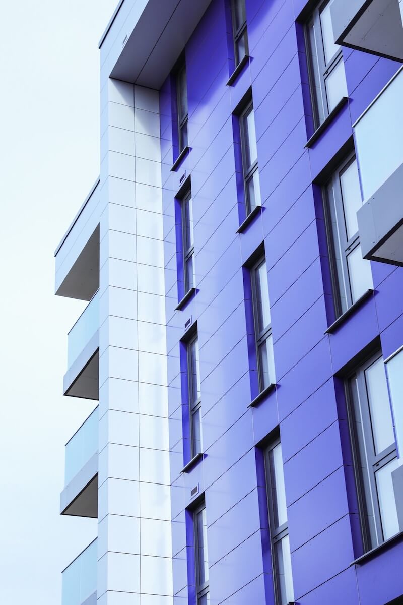 Alucobond cladding finish with firebreaks installed at slab level and around all window openings